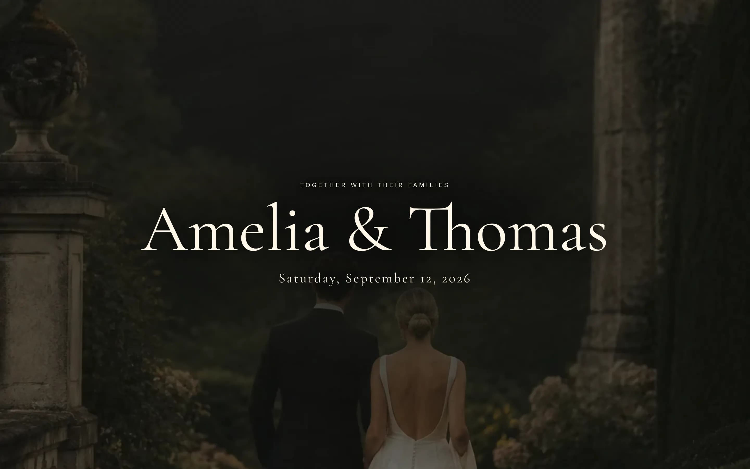 The Aurelia invitation open on a laptop, with the couple's names and date over their wedding photograph.